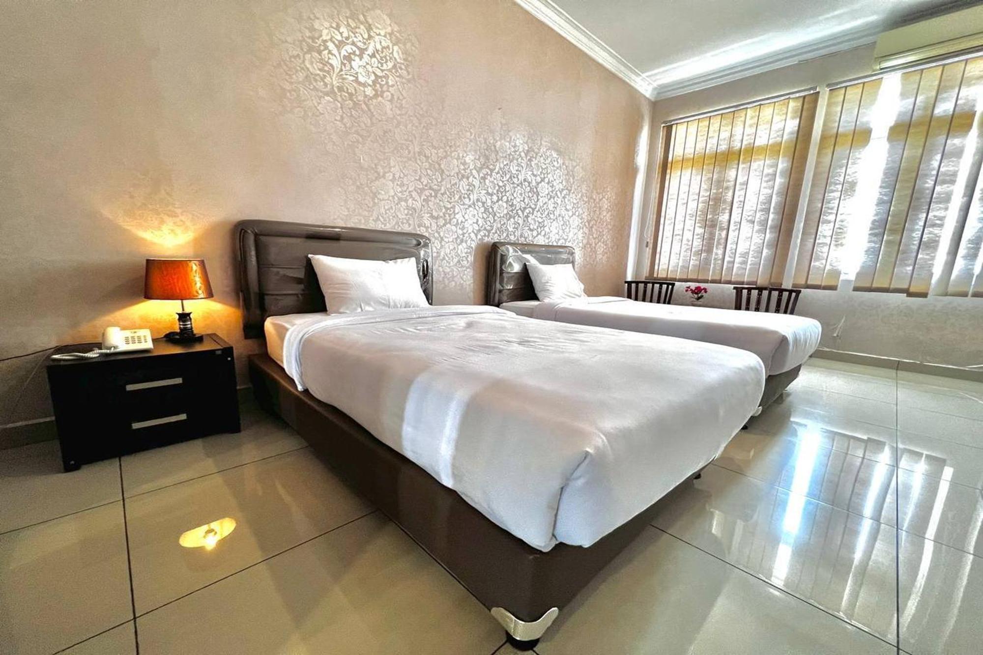 Ohulu Guesthouse Медан Экстерьер фото